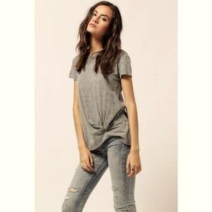 Juicy Couture, reglan short sleeves top , size Medium .Embellished rhinestones.